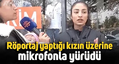 Ahsen TV muhabiri, soru sorduğu genç kızın üzerine mikrofonla yürüdü