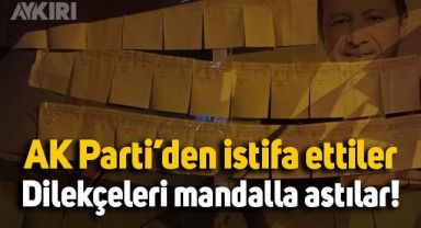AK Parti'den istifa ettiler, dilekçelerini mandalla parti binasına astılar
