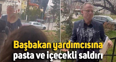 Başbakan yardımcısına pasta ve içecekli saldırı