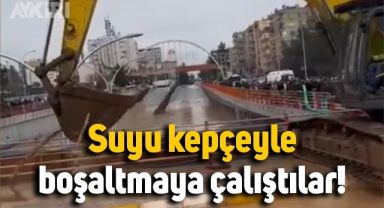 Şanlıurfa'da köprüde biriken sular kepçeyle boşaltılmaya çalışıldı