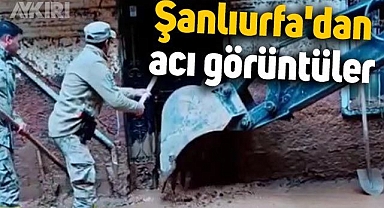 Şanlıurfa'da sel sularının dolduğu ev kepçe yardımıyla açıldı