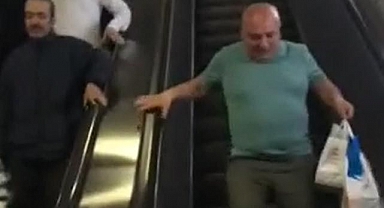 İstanbul'da ters yöndeki yürüyen merdivenden inmeye çalıştı, herkes alkışladı