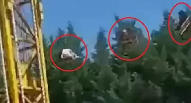 Lunaparkta korku dolu anlar: Salıncak ağaçların arasına daldı, insanlar ölümden döndü