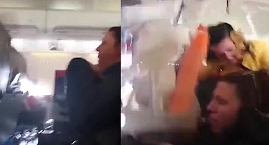 Uçakta yemek servisi yapılırken türbülansa girildi, ortaya bu görüntüler çıktı