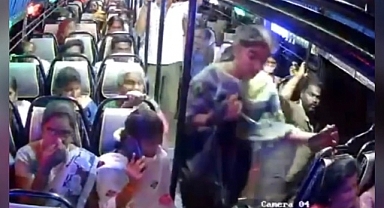 Otobüste düşmek üzere olan kadını, saçlarından tutup kurtardı